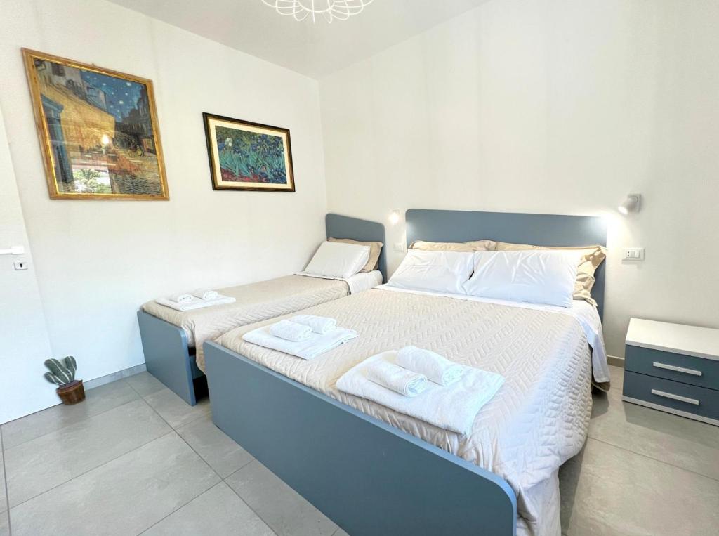 Camera con letto matrimoniale e singolo 2